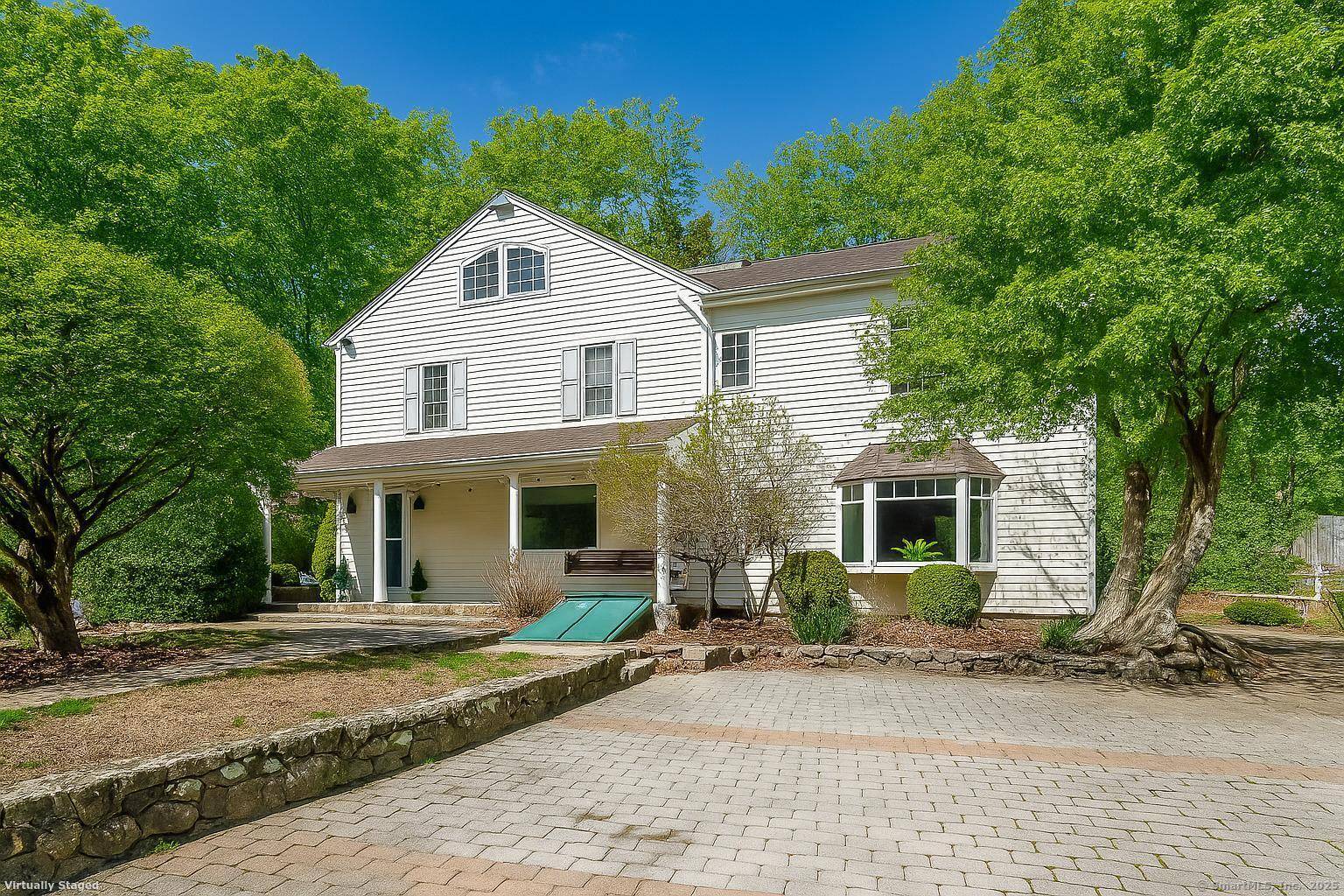 Step into the timeless charm of Rock House Woods, an enchanting 1800s farmhouse seamlessly blending historic character with modern conveniences, including GEOTHERMAL heating cooling !