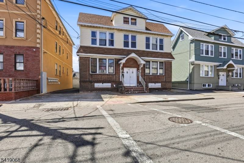 A Must see FOURPLEX UNITS Investor dream TURN KEY income producing property with with lots of upside, 4 residential apartments with exceptional possibilities within 6 minutes from Hillside Nj.
