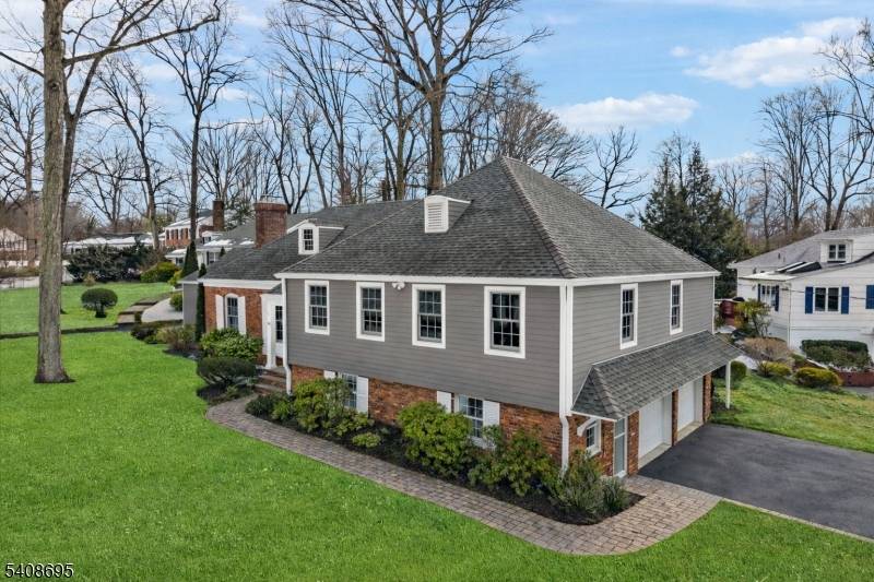 Coveted Convent Station corner property offering a beautifully maintained 4 bedroom, 3 bath residence on approximately.