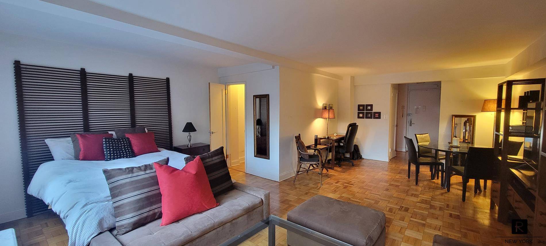 Enormous alcove studio with lots of quiet privacy and lots of sun from 18 feet of south facing windows.