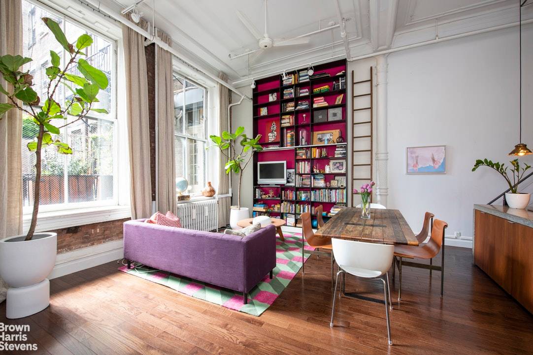 12 East 14th Street, unit 2B, is a bright, quiet loft with 15' ceilings and huge, original windows.