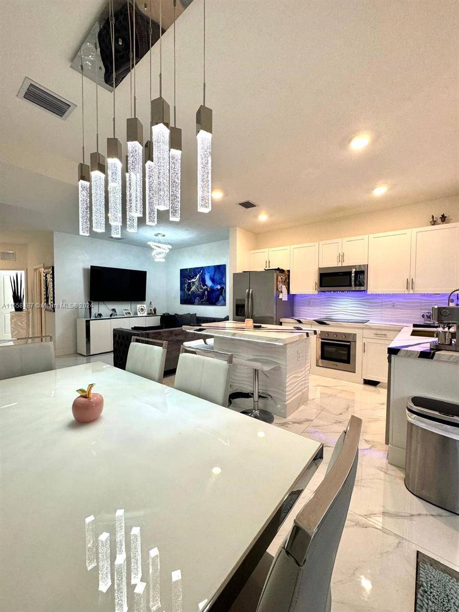Welcome to this 3 bed 3 bath SMART townhome in The Riviera, one of Homestead's newest amp ; most exclusive communities.