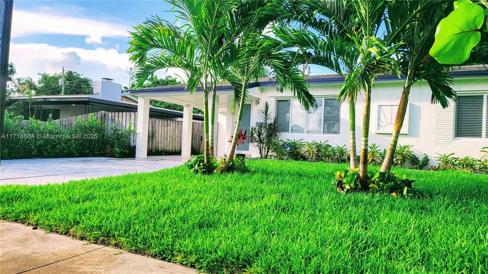 Updated throughout, this 2 1 has a large screened lanai and fenced yard with ample room for a pool.