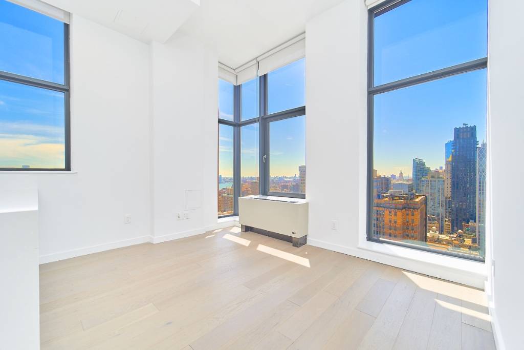 One of a kind Gut Reno Unit with Skyline Views.