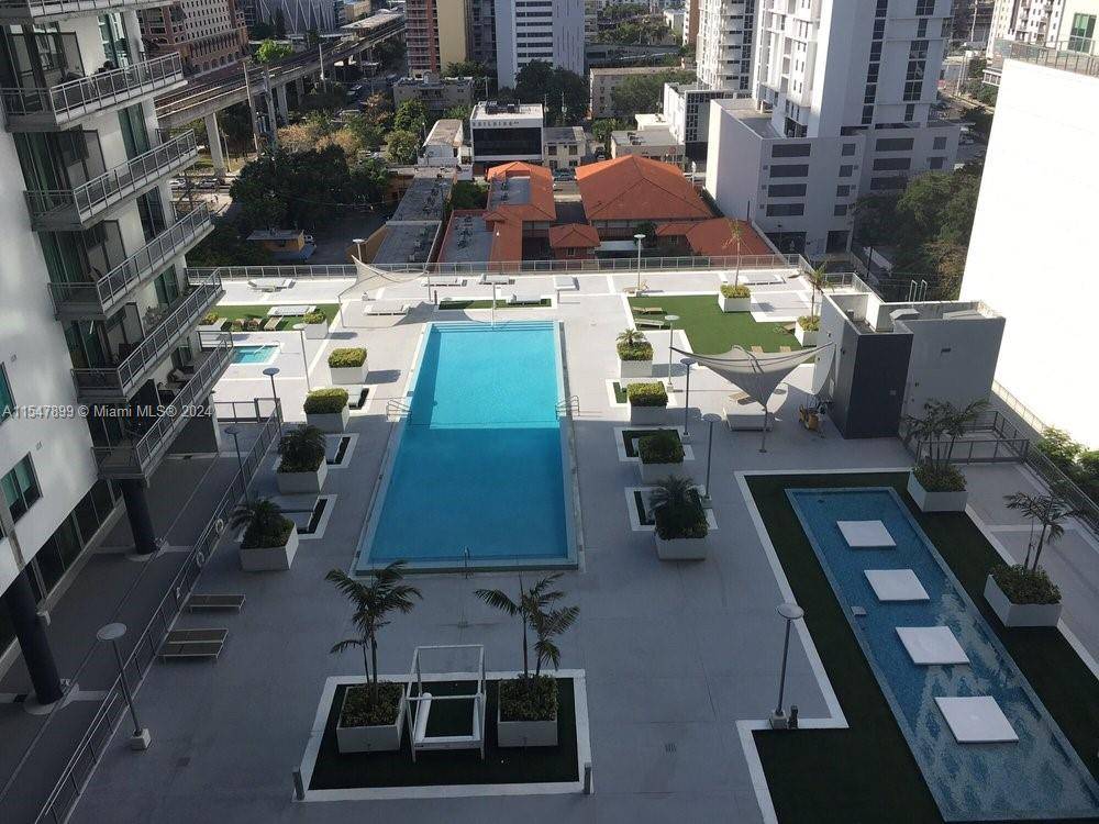 Amazing 1 Bedroom 1 1 2 baths, two story lofts, industrial style with concrete ceilings, water City views, new tile floor, remodeled baths, white glossy kitchen cabinets, new appliances, this ...