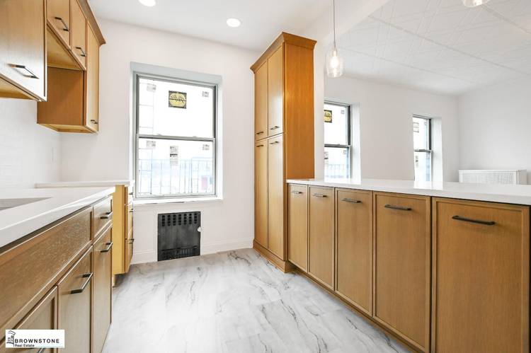 Brand New Renovation ! 81 1st Place is a stately brownstone extra wide with a deep front garden and large windows.