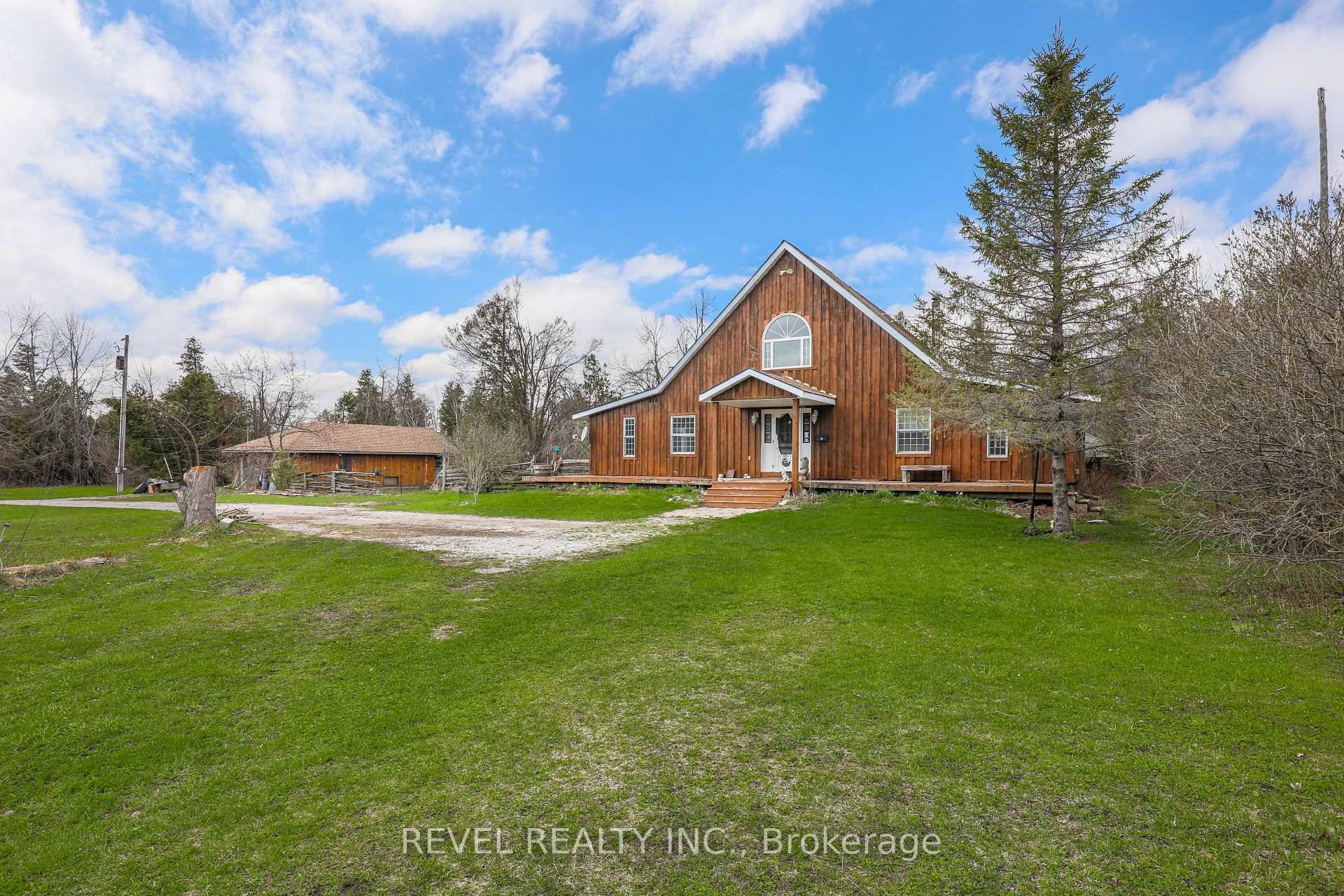 ENJOY LIVING ON THIS PRIVATE 60 ACRE PROPERTY JUST A SHORT DRIVE FROM LINDSAY.