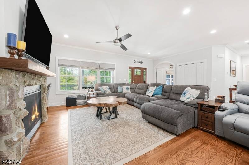 Set back on a 2. 42 acre lot, meticulously designed, home offers luxury, space functionality at every turn.