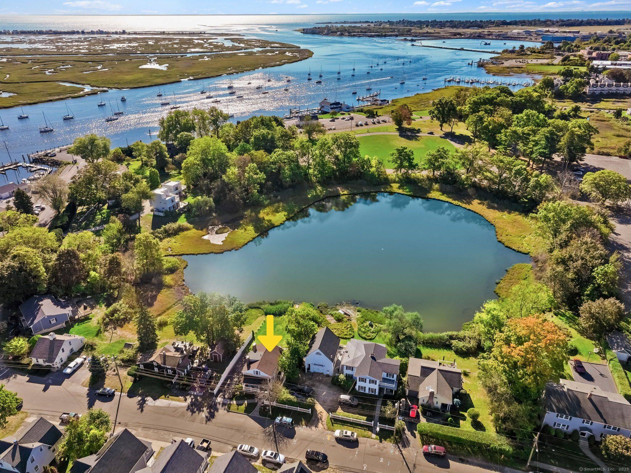 Welcome to 753 Stratford Avenue, a stunning coastal gem with breathtaking water views, proudly listed on the National Historic Registry.