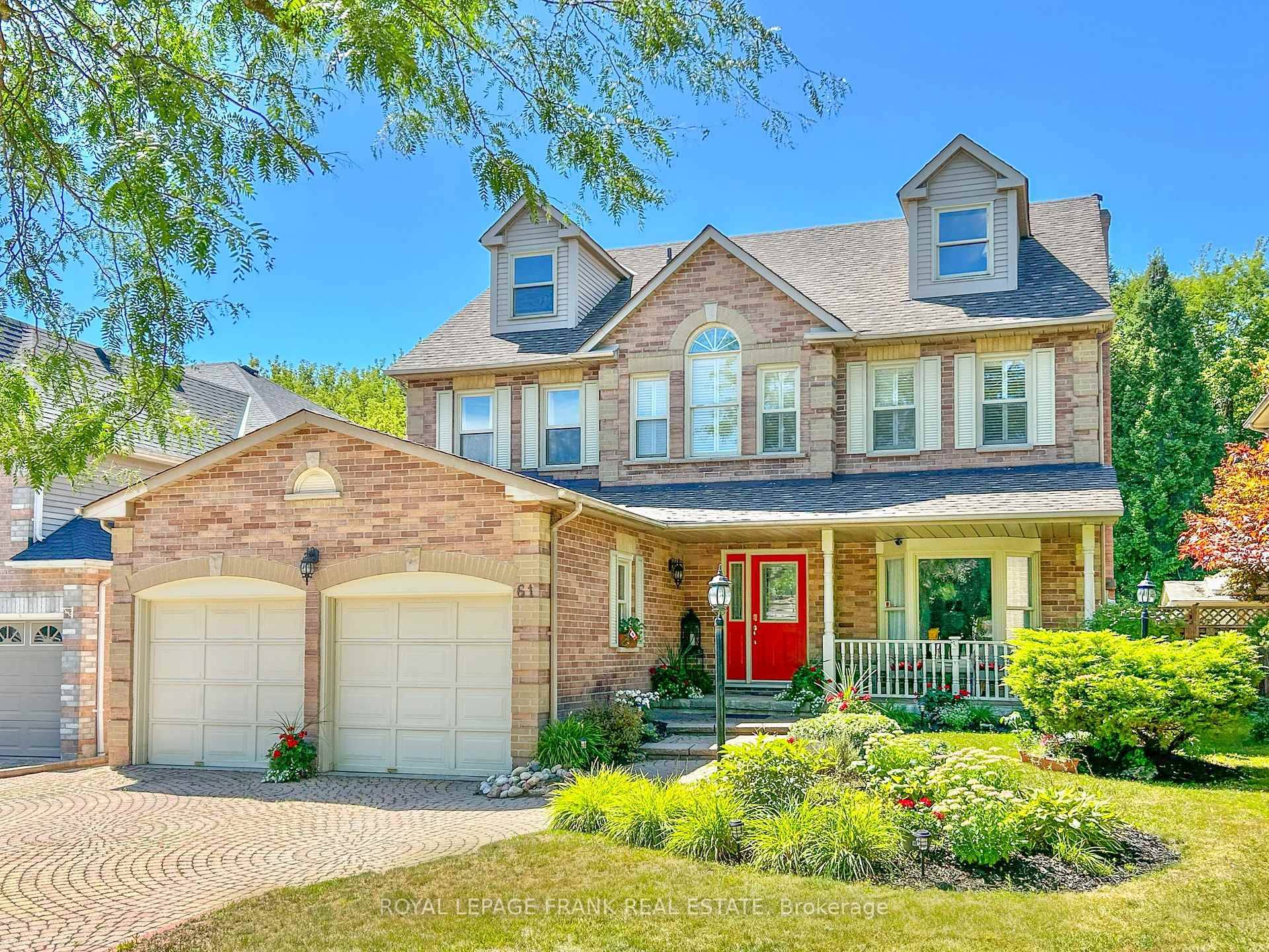 The Welcoming Front Porch offers shade and shelter to enjoy the Landscaped gardens watered by the In Ground Sprinkler System.