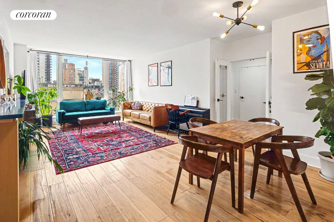 This bright and well appointed three bedroom, two bathroom residence at Bridge Tower Place is move in ready and thoughtfully updated throughout.