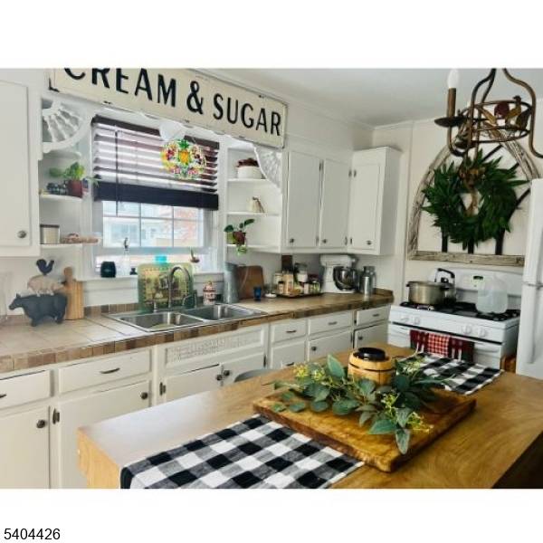 Welcome to this meticulously maintained 1950 ?