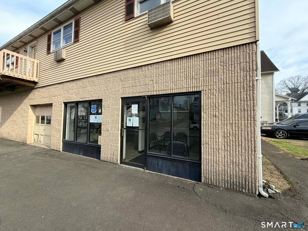 Prime Mixed Use Investment Property with 1 store and 3 apartments and large 2 car garage.