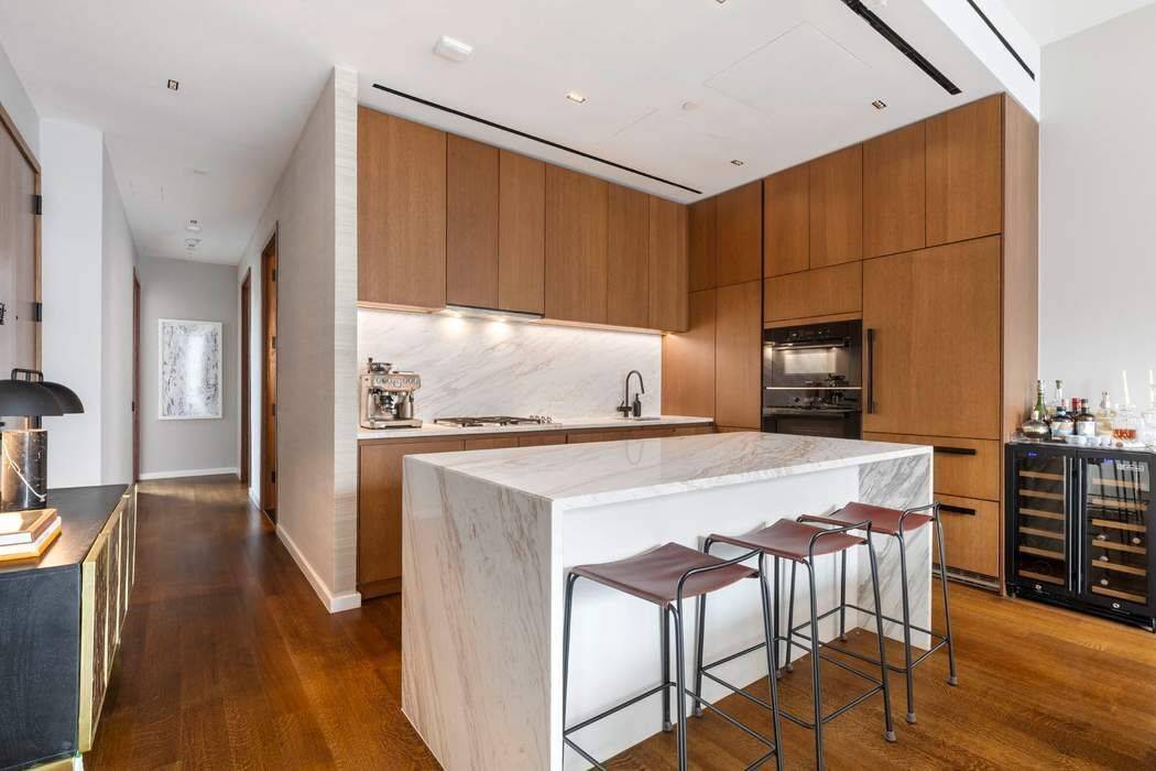 Presenting Residence 12B at 570 Broome Street a meticulously designed three bedroom, three bathroom sanctuary in one of Hudson Square s most refined boutique condominiums.