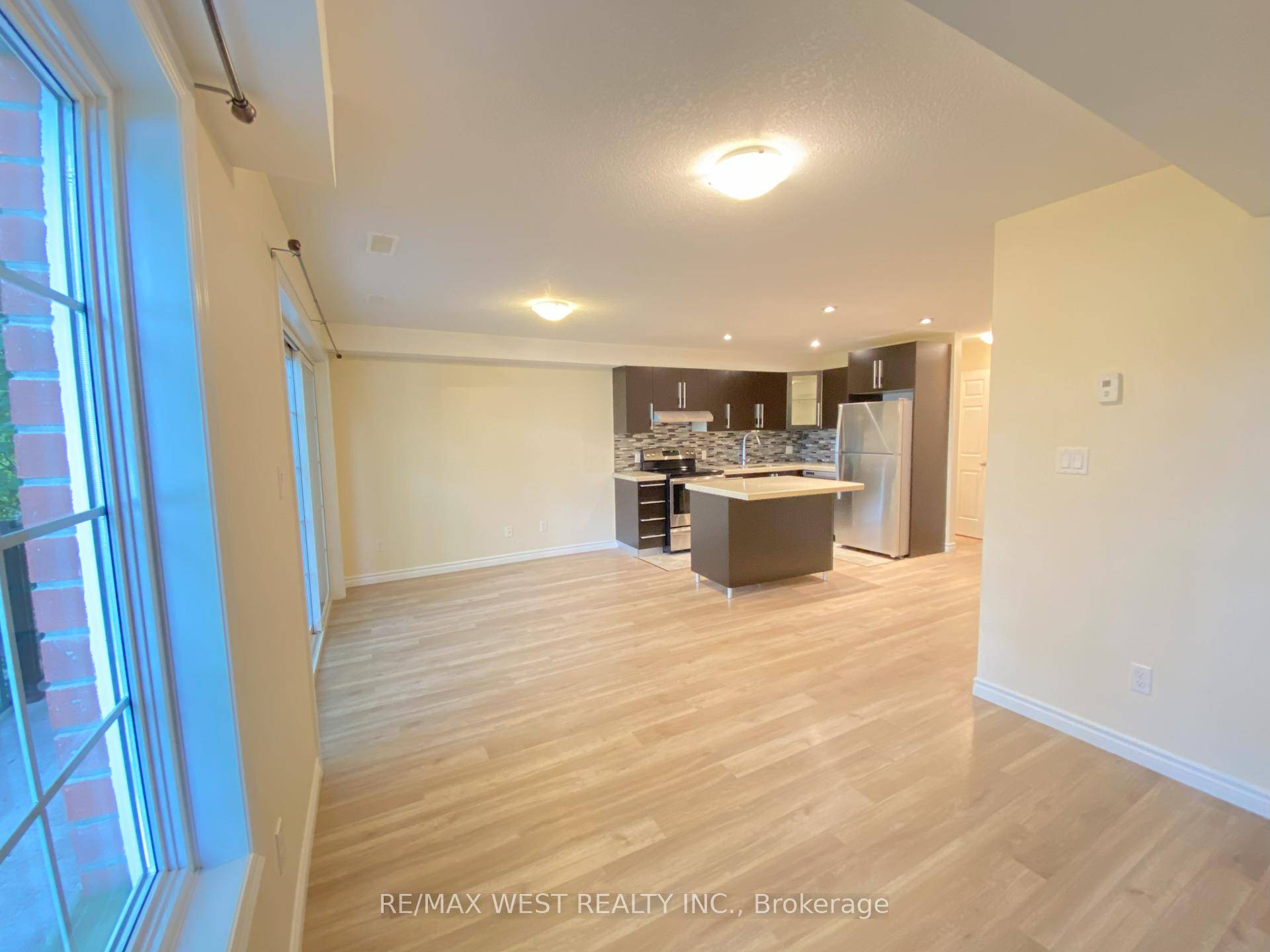 This Stack Townhouse Features A Beautiful open Concept Feel Living Room.