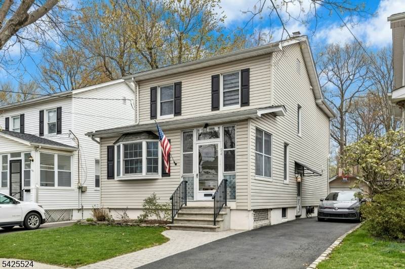 This classic Colonial is much larger than it appears and beautifully updated throughout !