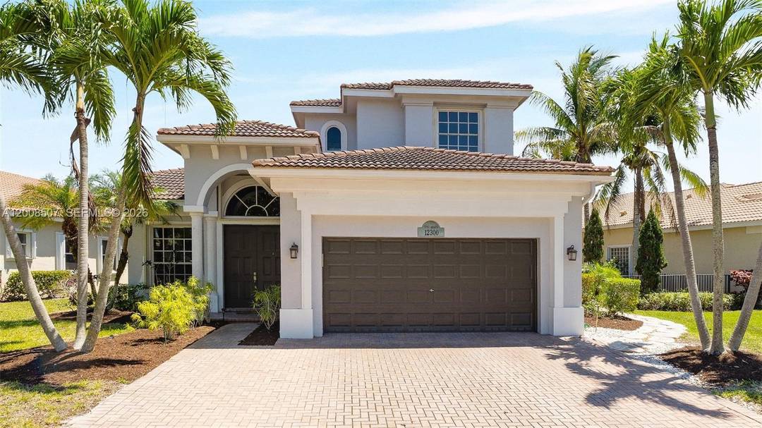 Sensational 4BR 3BA home in the highly sought after, gated community of Heron Bay, offering one of the best long lake views in Heron Bay.