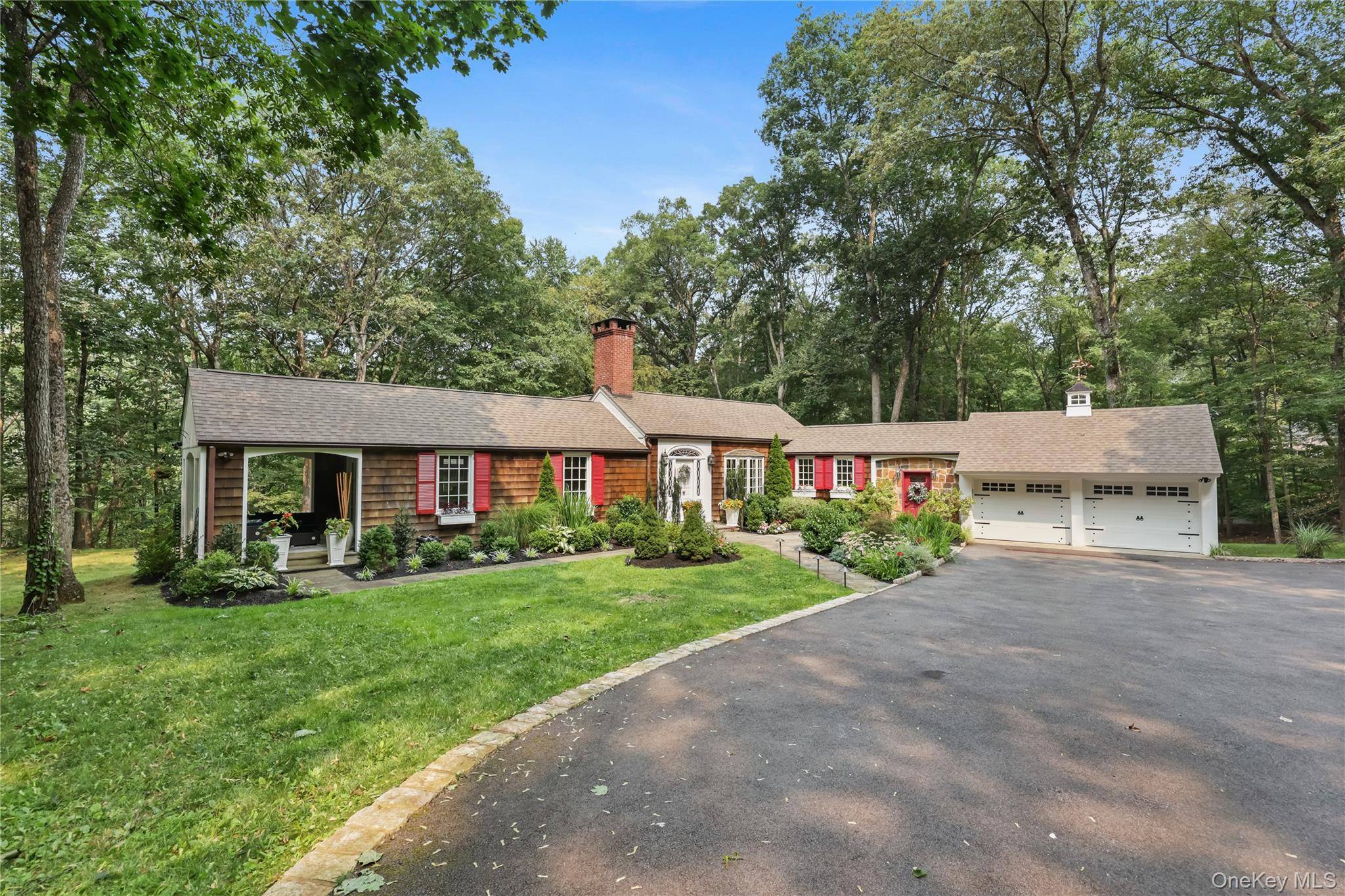 Hywood Ledge is a spectacular expanded ranch in the desirable Deepwood neighborhood of Chappaqua, which presents sophisticated charm and tranquility.