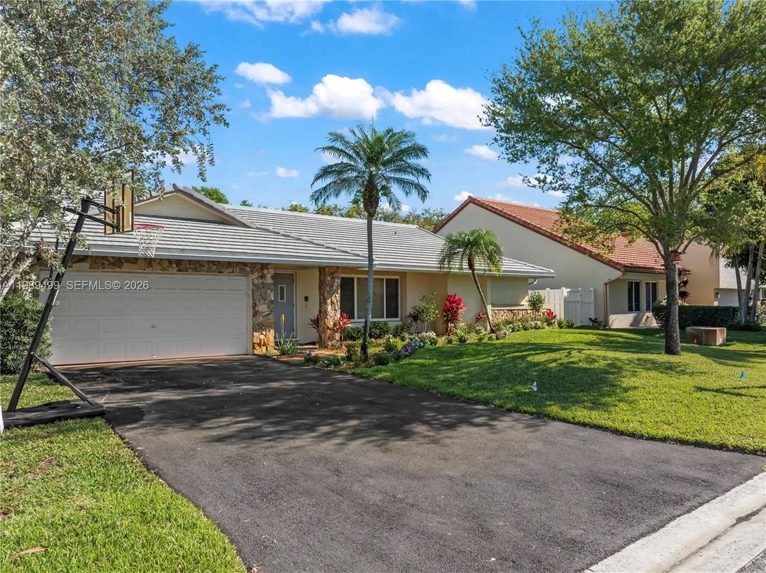 Welcome to Cypress Glen in Coral Springs, where space, natural light, and a private pool come together in a desirable community.