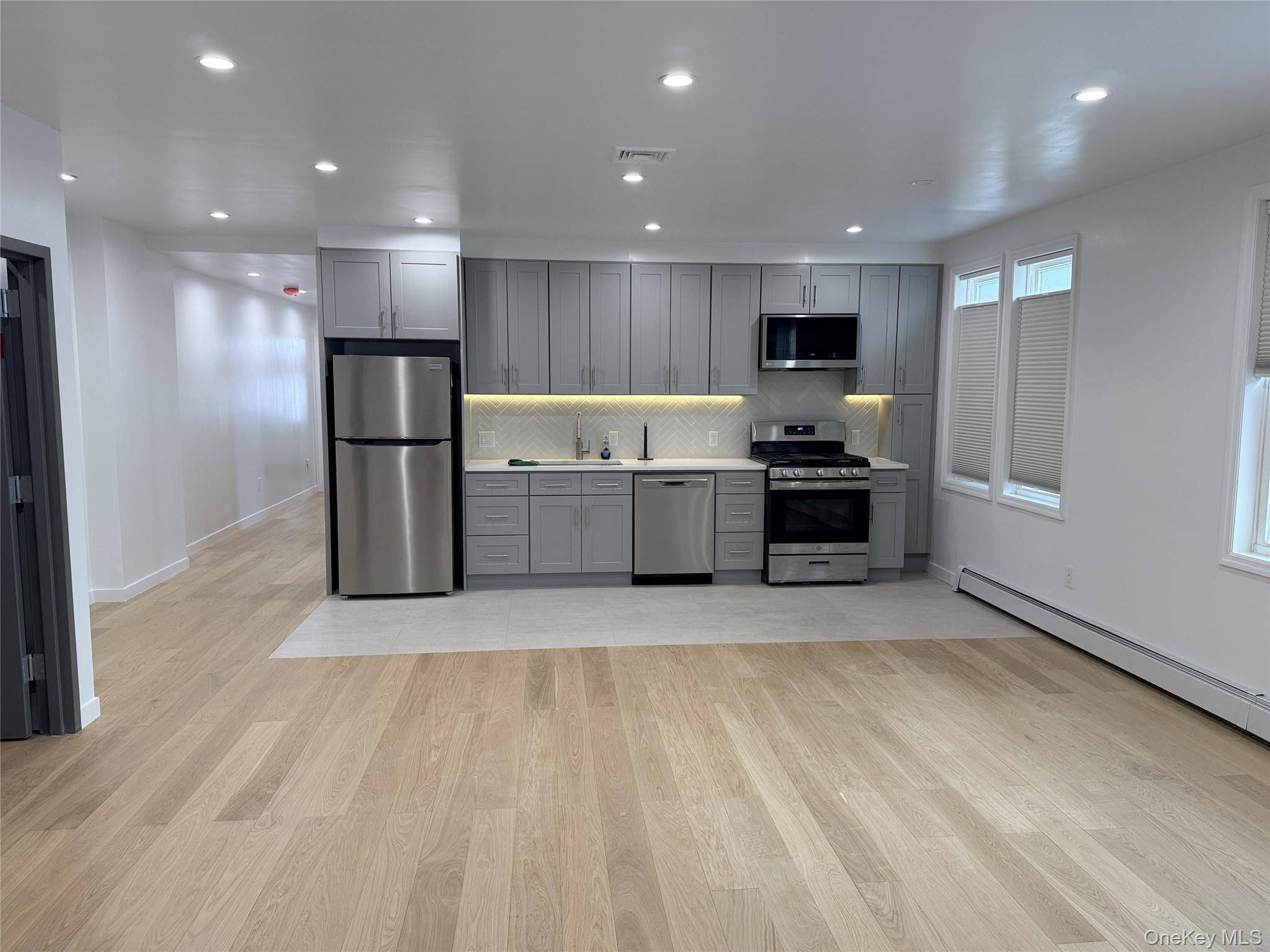 Bright, spacious, and renovated 3 bedroom flex 4 bedroom duplex with 1 and a half bathrooms on the main level and another full bathroom on the lower level.