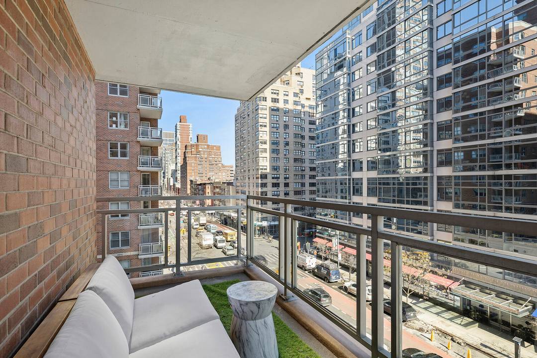 Beautifully renovated three bedroom, two bathroom residence with a private balcony and approximately 1, 534 interior square feet.