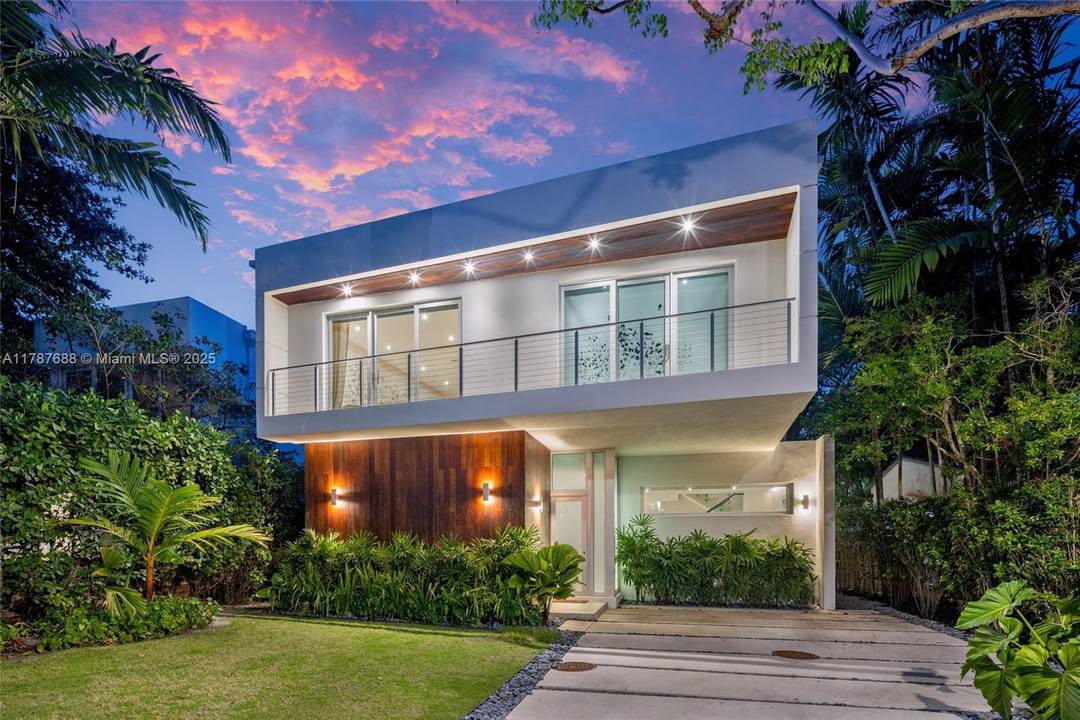 Stunning 5BD 4. 5BA custom home in Coconut Grove, fully renovated with luxury finishes and thoughtful design.