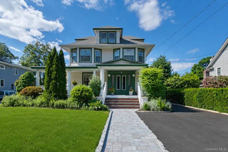 This recently renovated home offers the perfect blend of modern luxury and classic North Shore charm.
