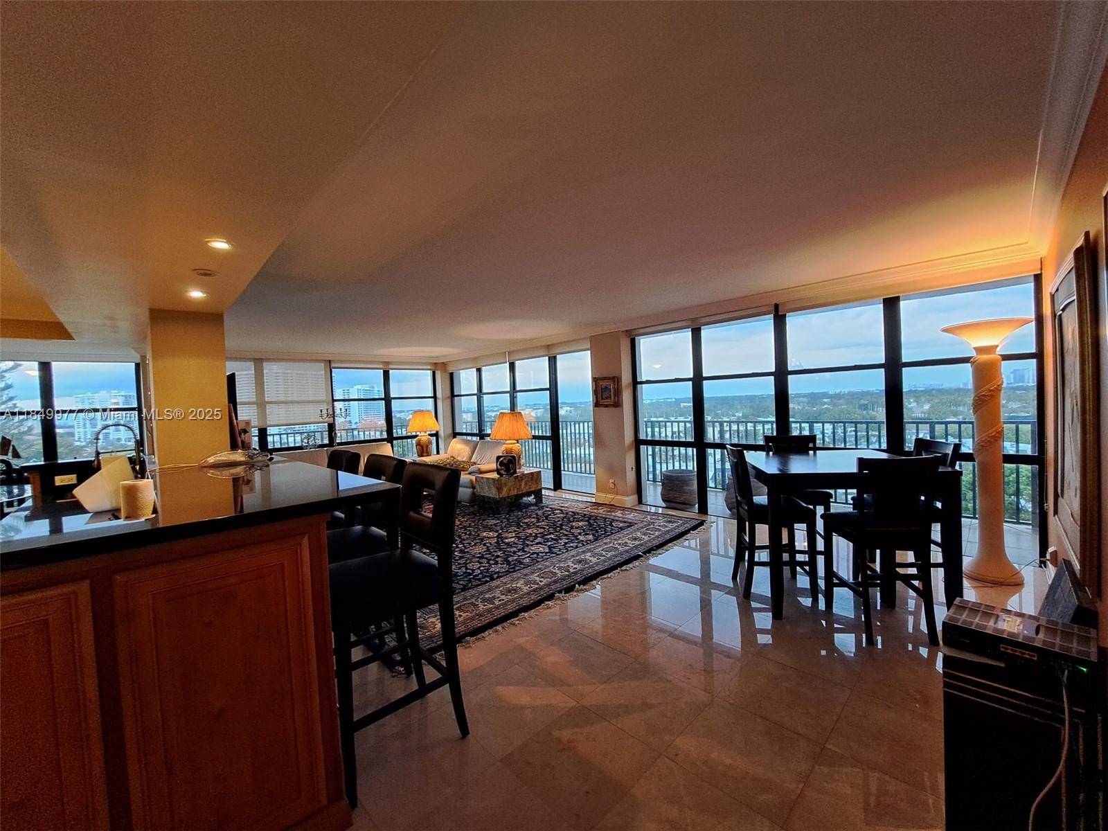 Discover coastal living at its finest in this beautifully appointed 2 bedroom, 2 bathroom corner condo in the heart of Hallandale Beach s exclusive Three Islands community.