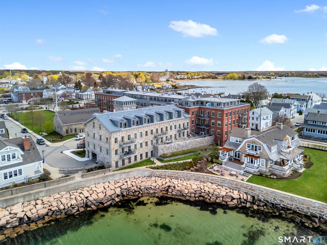 A rare offering presents itself in sought after Stonington Commons.