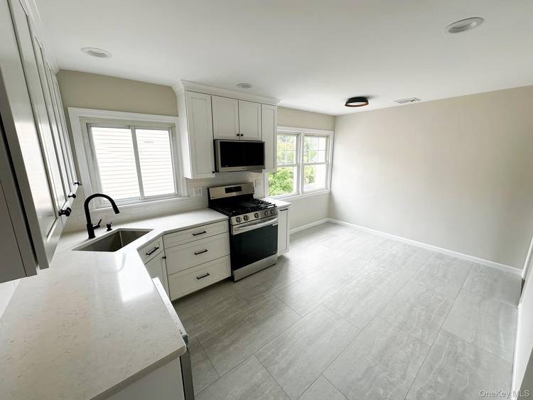 Spacious newly renovated 4 bedroom, 2 bath second floor apartment, available July 15, 2026, Harrison Central School District, 4 minute walk to Metro North, easy commute to NYC, in unit ...