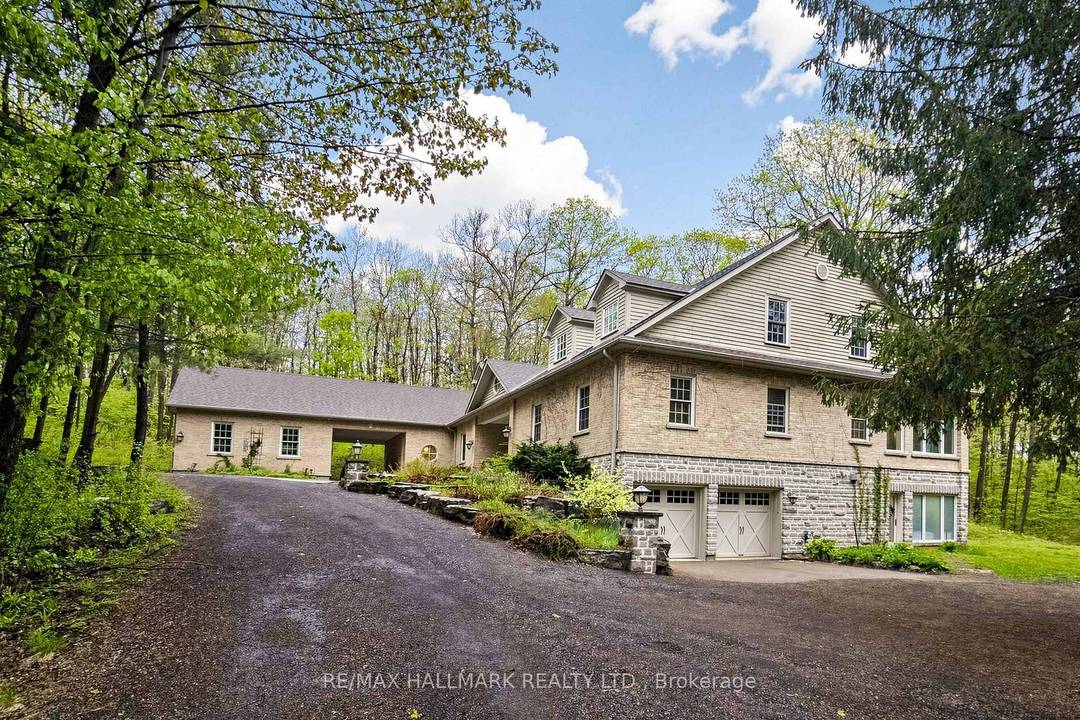 RARE OPPORTUNITY ! ! Enjoy Luxury Estate Living Set On Nearly 5 Acres Of Unmatched Privacy Surrounded By Lush Greenery, Forested Views amp ; Expansive Outdoor Space.