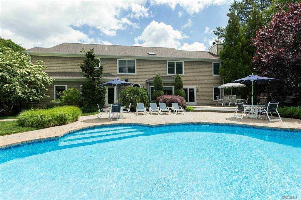 Located on a quiet cul de sac, this immaculate 4650sf Post Modern offers high ceilings, plenty of natural light and a host of amenities.