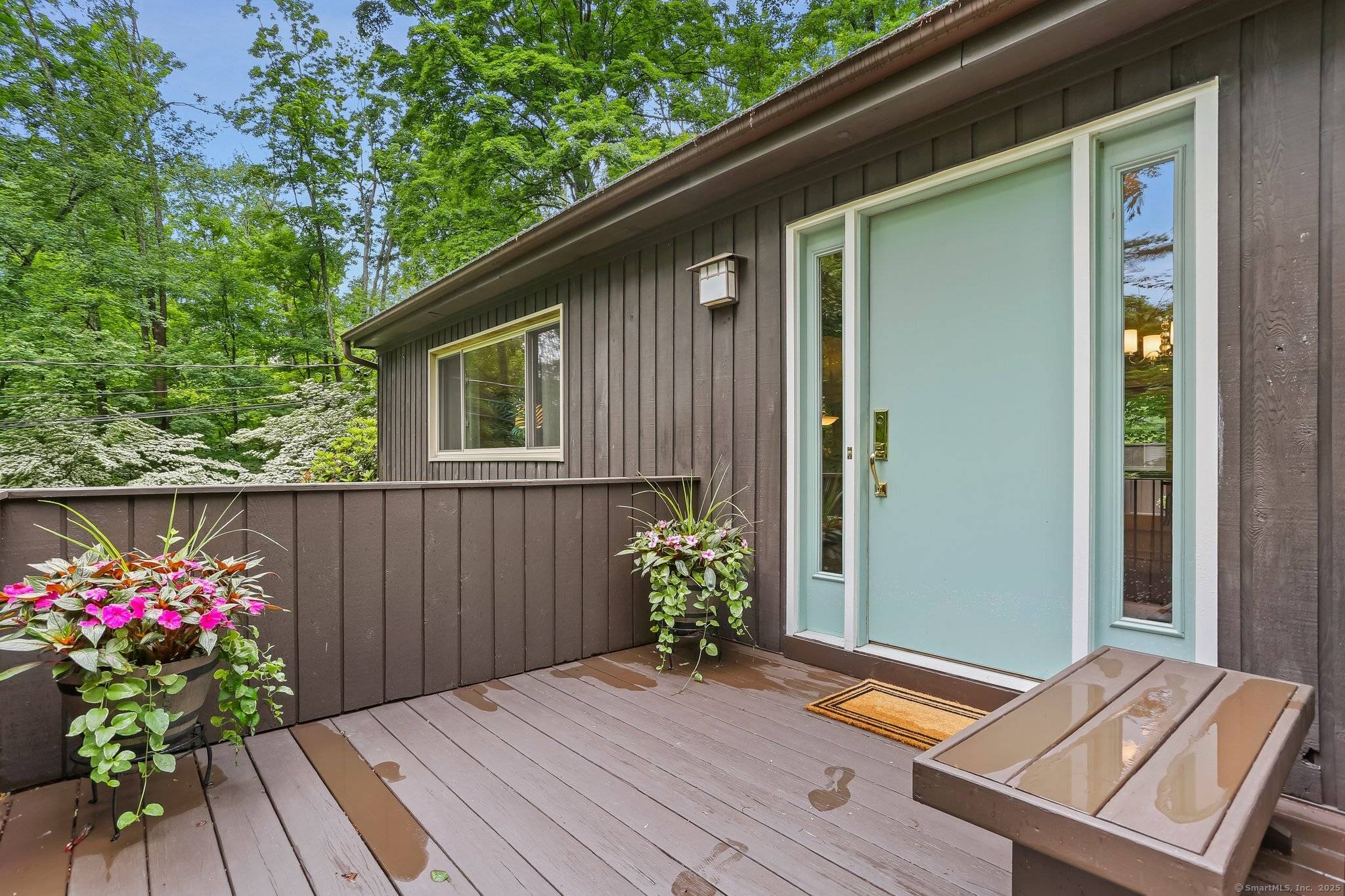 Experience gracious living in this 5 bed, 3 bath Mattera built contemporary high ranch on a sprawling one acre lot adorned with mature landscaping and captivating rock outcroppings.