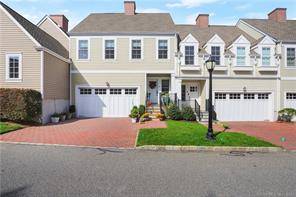 PALMER HILL Sunlit 3 br 3 bth condo with 3 floors of living and private terrace.