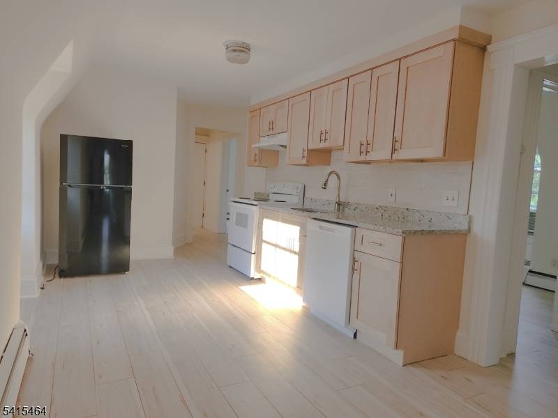 Welcome to this well maintained and versatile 3 family property in Roselle Park a rare opportunity that appeals to both investors and owner occupants alike.