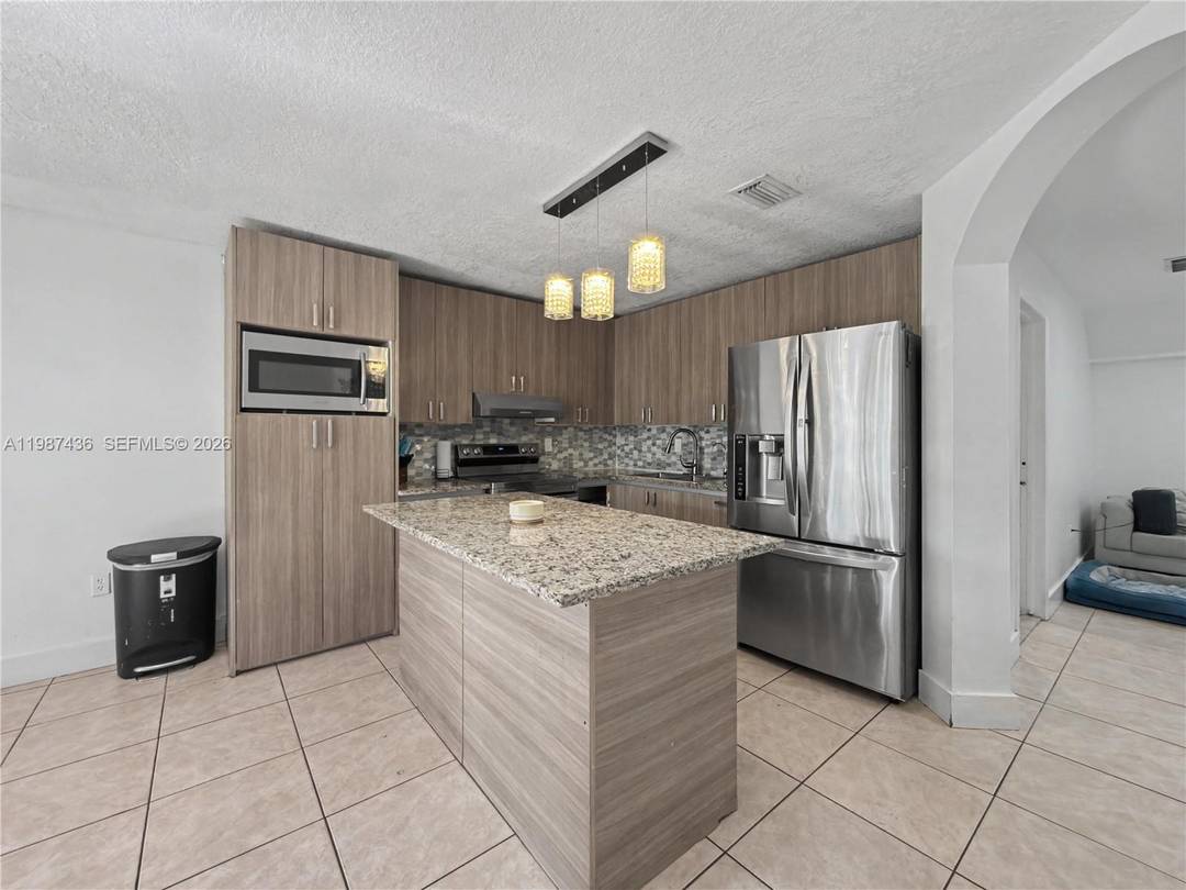 4 bedroom, 3 bath townhouse with a garage located in the desirable Kendall area.