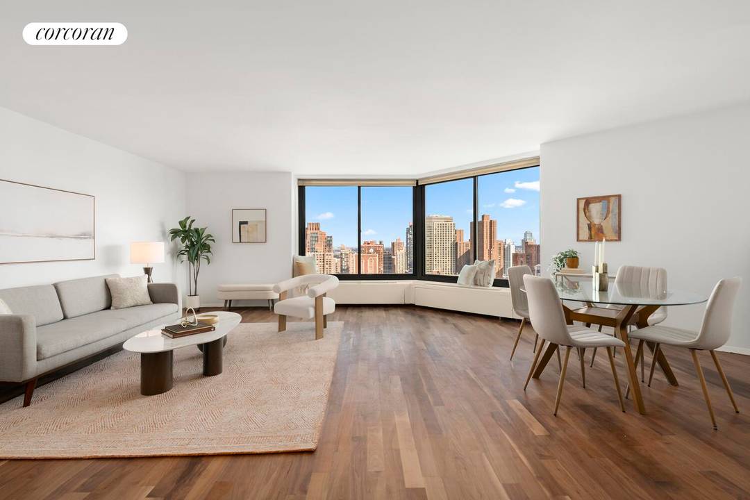 Expansive wrap around views and light fill this beautiful 1BR 1BA Carnegie Hill condo.