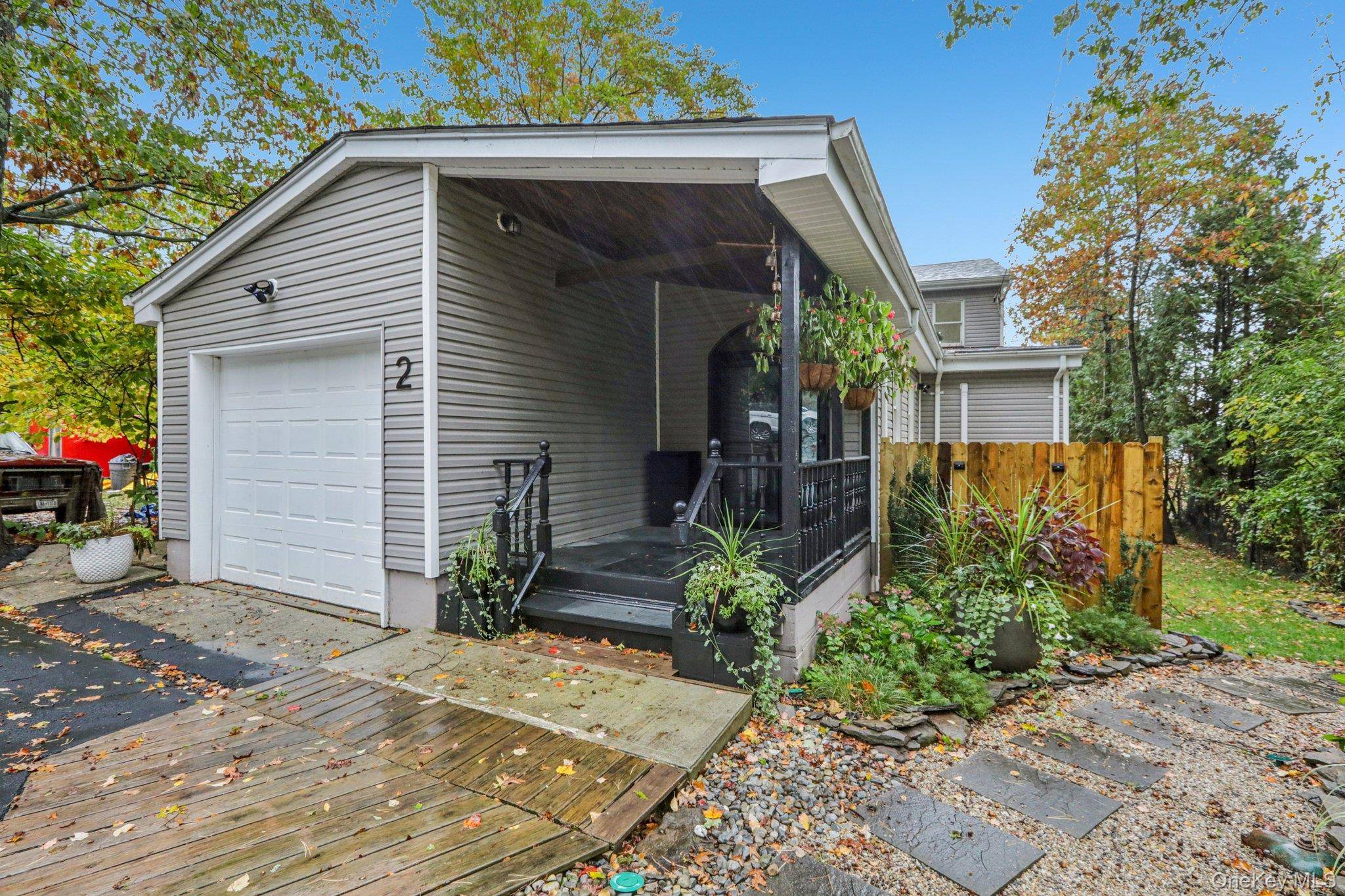 This stunning, fully renovated home blends modern luxury with lakeside tranquility.