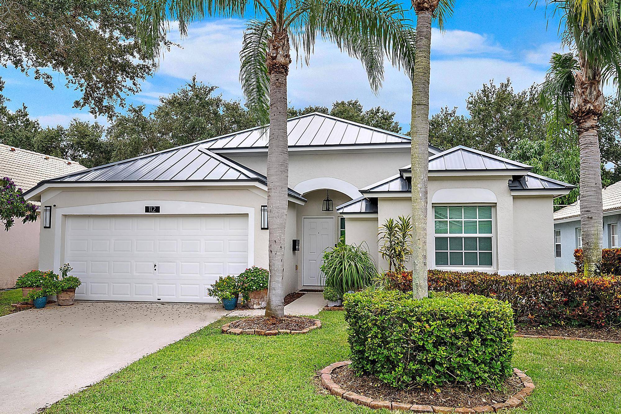 Welcome to 112 Spoonbill Court in the heart of Jupiter !