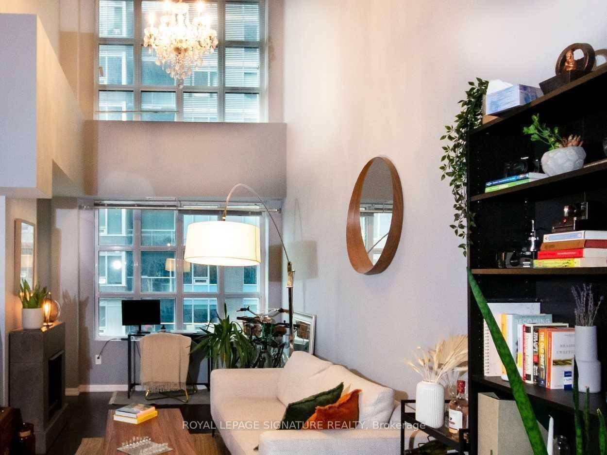 Luxurious Loft Style Suite with Rare 2 Level 17Ft Cathedral Ceilings 1 of Only 3 Units in 65 East Liberty St with this Highly Sought After Floor Plan.