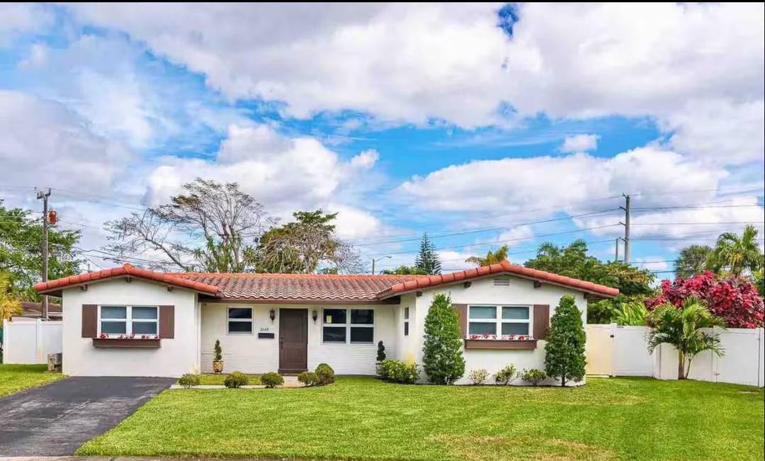 This is a beautiful fully furnished house with a heated private pool, oversized backyard with a shaded lanai area.