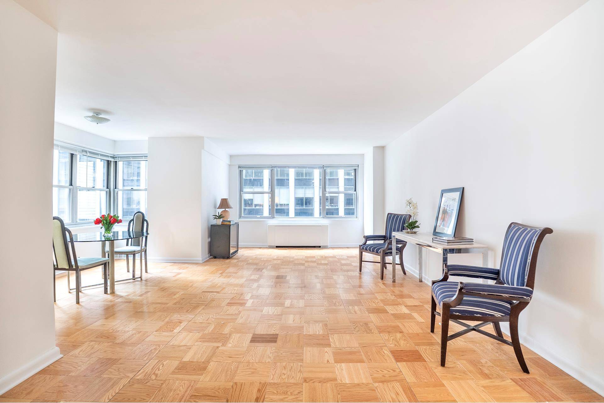 Situated on the sun drenched southeast corner of 77 West 55th Street, we welcome you to this spacious and well laid out two bedroom, two bathroom condominium located in the ...