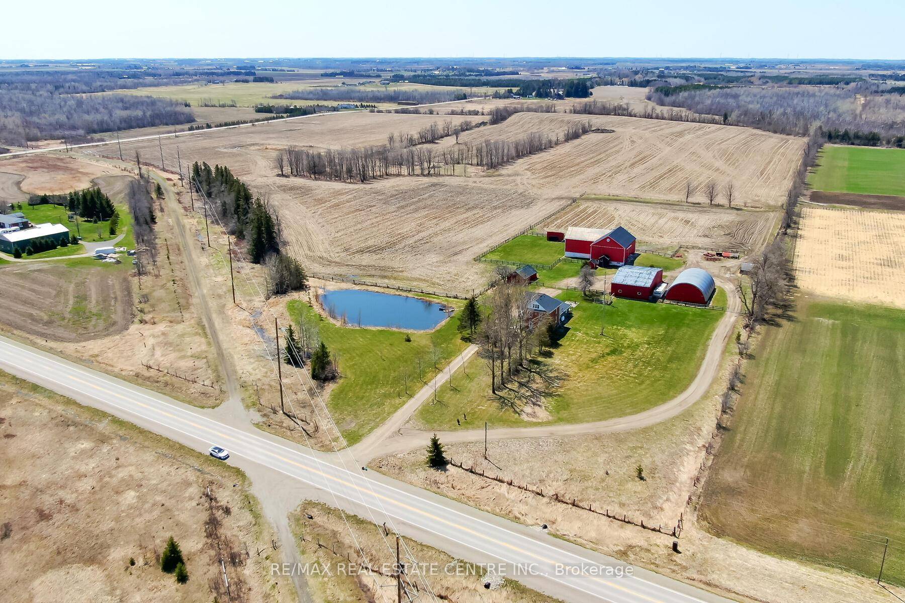 Live at this beautiful 2 storey farm house on this 84 acre farm with rolling hills, bank barn, multiple outbuildings.