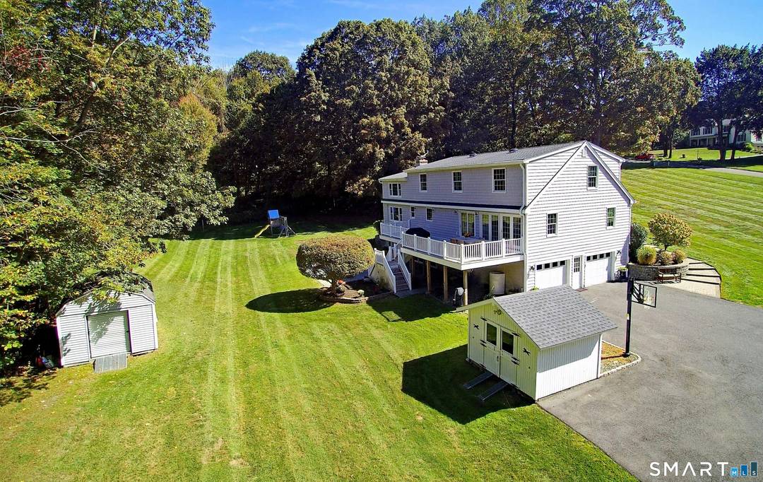 Exceptional 5BR colonial in sought after Westmoreland recreational neighborhood on park like acre with front porch, flowering trees, sprawling level lawn, expansive deck, stone patio, hot tub, multiple garden sheds, ...