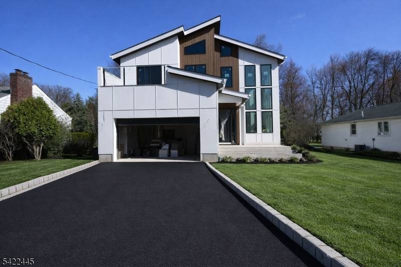 Welcome to 52 Congressional, this stunning new construction home features 6 bedrooms and 5.