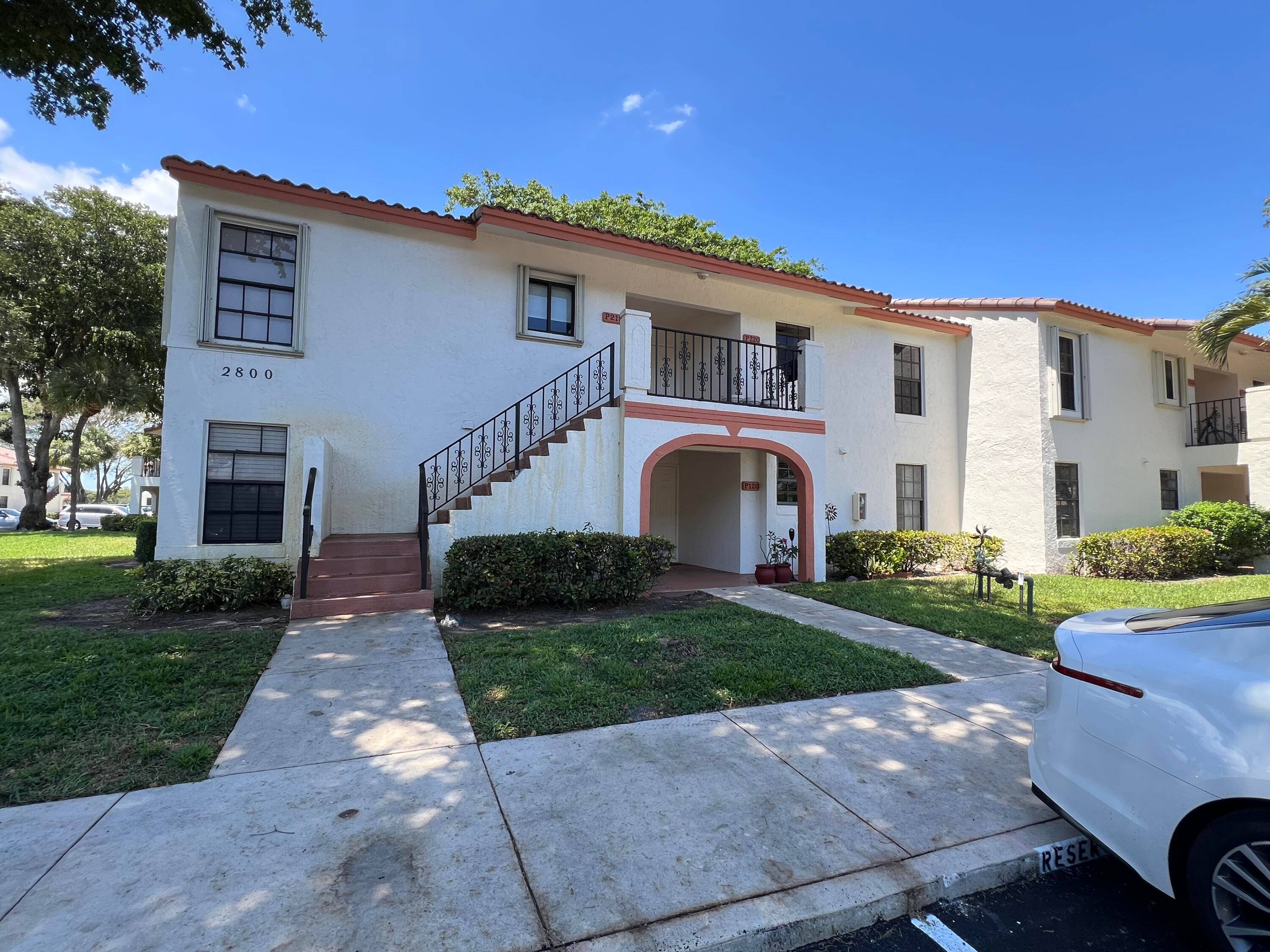 Investor's Dream in East Boca Raton, Gated community of Lake WindWood, breathtaking lake view.