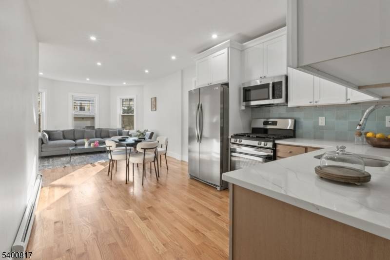 tep into this stunning 3 family gem ?