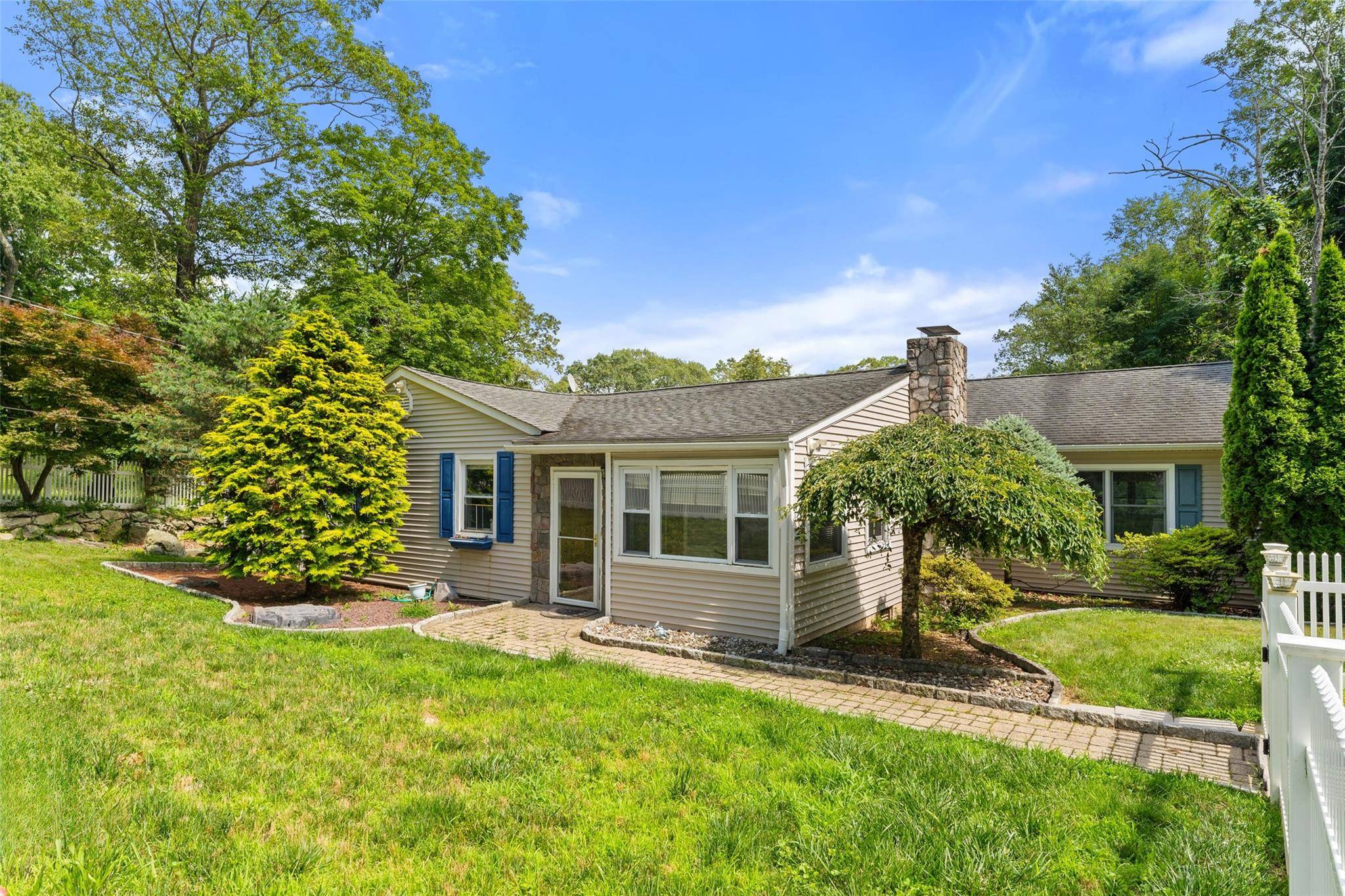 Welcome to this charming 3 bedroom, 2 full bath ranch style home with private Lake Mahopac Woods Association in beautiful Mahopac.
