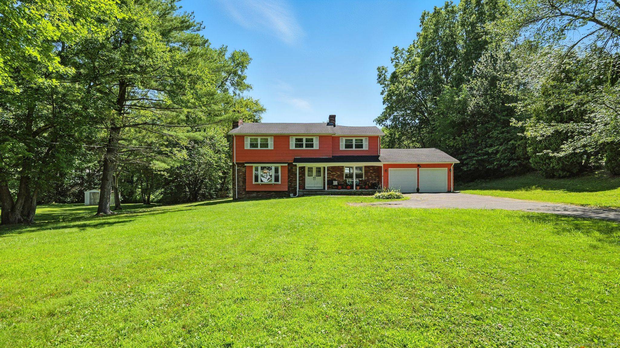 This colonial oversize colonial has all the space to grow and build new memories within.