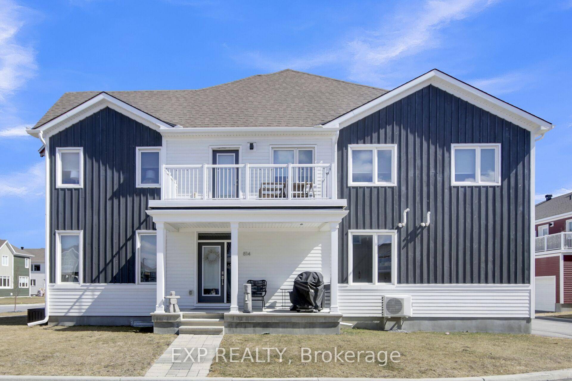 Welcome to 814 Bascule Place, a stylish 2022 end unit FREEHOLD townhome with a double garage and a premium southwest facing lot.